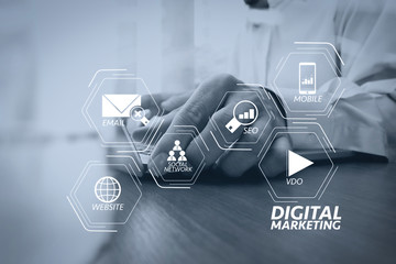 Poster - businessman hand working with new modern computer and digital business strategy diagram as concept