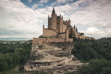 Alcazar castle in Segovia with Peñalara mountain. Castilla y Leon, Spain