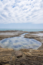 Natural Rock Pool At The Coast, Jeju Island, South Korea.