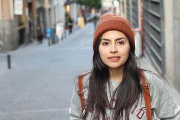 Gorgeous ethnic woman smiling with copy space