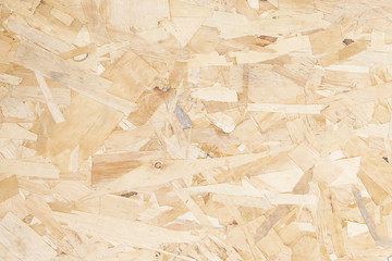 Recycled compressed plywood board texture or background.