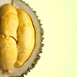 Closeup of durian fruits on yellow background