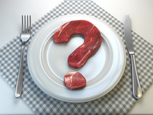 Plate With Raw Meat In The Shape Of A Question Mark. Concept Of Diet And Healthy Nutrition Or To Eat A Meat Or To Be Vegetarian Concept.