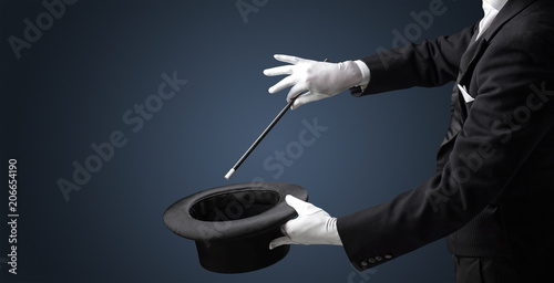 Cuadros en Lienzo Illusionist white hand wants to conjure with magic wand from a black cylinder so