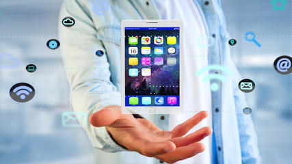 Poster - Businessman holding a tablet surrounding by app and social icon - 3d render