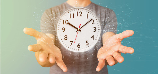 Poster - Man holding a clock timer 3d rendering