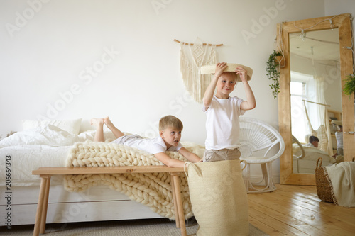 Picture Of Two Adorable Caucasian Schoolboys Having Fun