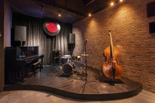 Modern Jazz Bar Interior Design, Stage With Black Piano And Cello