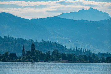 Wall Mural - Foggy morning landscape on the shores of the Obersee (Upper Lake Zurich) , Switzerland