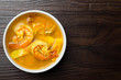 © natsarun - Southern Thai Spicy Sour Yellow Curry with Shrimp and Coconut Shoots, Sour soup made of Tamarind Paste or Turmeric.