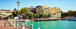 Bridge embankment yacht pier Lake Garda restaurants hotels luxur