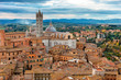 A picturesque view of Siena in the fall from the tower.The wonderful medieval city of Siena in Tuscany region, Italy.Beautiful panoramic view of Siena and the Siena Cathedral