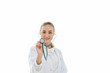 © thbangkok - Confident female and young beautiful doctor in white uniform holding stethoscope willing and always ready to help you. Isolated on white background