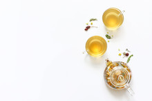 Herbal Tea Of Mint, Chamomile, Rose Hip And Other Herbs On White Background.