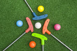 Four Mini Golf Putters with Balls