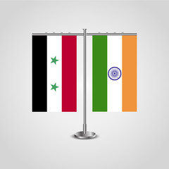 Wall Mural - Table stand with flags of Syria and India.Two flag. Flag pole. Symbolizing the cooperation between the two countries. Table flags