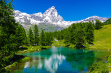 Beautiful Landscape With The Matterhorn (Cervino) And Another Matterhorn (Cervino) Reflected On The Blue Lake (Lago Blu) Near Breuil-Cervinia, Aosta, Italy