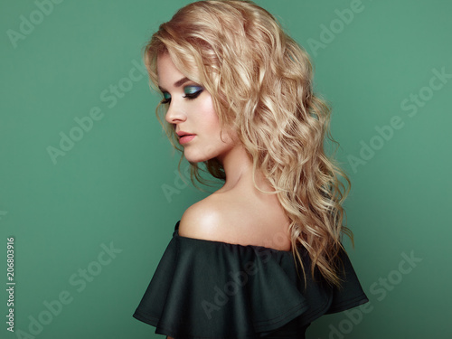 Blonde Girl With Long And Shiny Curly Hair Beautiful Model Woman
