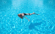© biletskiyevgeniy.com - Girl relax in the pool. Beautiful girl as a concept and idea of relax time