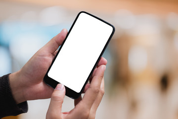 man hand holding smartphone. blank screen mobile phone for graphic display montage