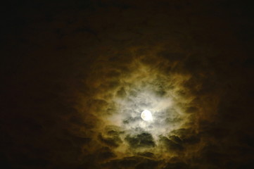 Wall Mural - full moon cover by spreading cloud in night