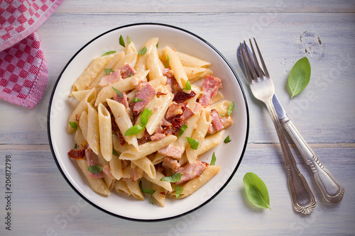 Penne Pasta With Bacon And Sundried Tomatoes Alfredo Penne Pasta On White Plate On Wooden Table Overhead Horizontal Buy This Stock Photo And Explore Similar Images At Adobe Stock Adobe Stock