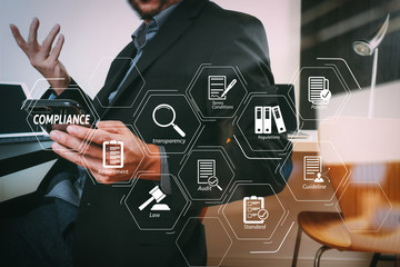 Poster - smart medical doctor working with smart phone and digital tablet and laptop computer and stethoscope in modern office at hospital