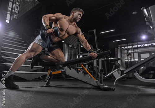 Fotografie, Tablou  Handsome young fit muscular caucasian man of model appearance workout training i