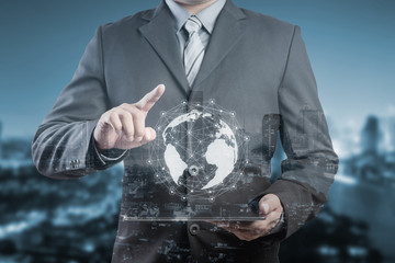 Poster - Businessman hand touching virtual button on Earth map point with network connection, international meaning