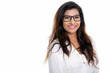 Studio shot of young happy Persian woman smiling with eyeglasses
