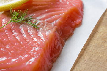 one piece of meaty salmon fillet on the table