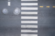 © Naypong Studio - Aerial photo top view over pedestrian crossing on traffic road