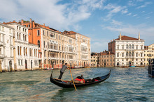 Venetian Gondolier Punts Gondola In Venice, Italy