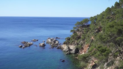 Fototapete - Sunny landscape of Cala Estreta in Costa Brava, Spain.