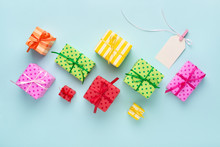 Blank Gift Tag With Ribbon & Colorful Gift Boxes.