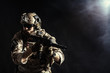 © fotofabrika - Special forces soldier with rifle on dark background