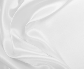 smooth elegant white silk or satin luxury cloth texture as wedding background. luxurious background 