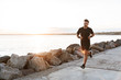 canvas print picture - Portrait of a healthy sportsman jogging