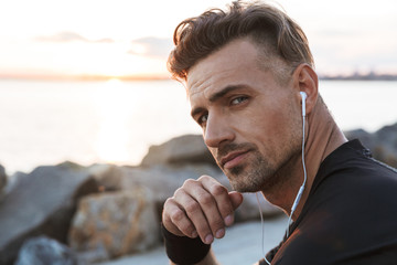 Wall Mural - Close up portrait of a handsome sportsman