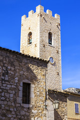 VENCE, FRANCE, on March 6, 2018. The sun lights the bell tower in the old city. 