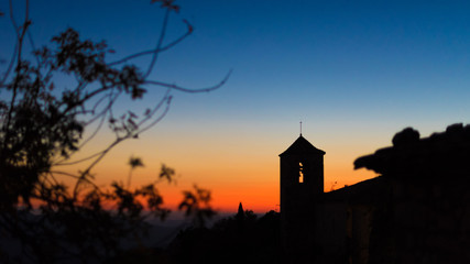 Wall Mural - View of the Romanesque church of Santa Maria de Siurana at sunset in Siurana de Prades, Tarragona, Spain. Copy space for text.