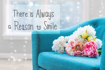 There Is Always A Reason to Smile message with flower bouquets with turquoise chair