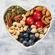 © bit24 - Healthy snack in heart shaped bowl