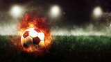 Fototapeta Sport - Football on fire concept