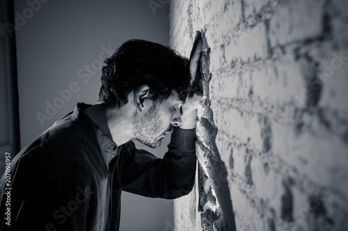 Cuadros en Lienzo sad depressed businessman feeling lonely at home in mental help concept