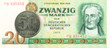 50 pfennig coin against historic 20 east german mark bank note