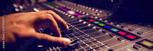 Fotografía Cropped hand of musician using sound mixer