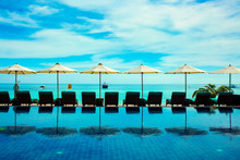 Beach Resort Umbrella Reflect With Sea