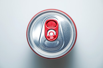 Metal cans with cooling drinks on a white background