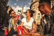 © BalanceFormCreative - Group of friends hangout at the street.They  drinking cold juice.Fast food concept.
